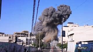 Israeli Air Strike Leaves Bank Flattened in Gaza City - Yideos | Your ...