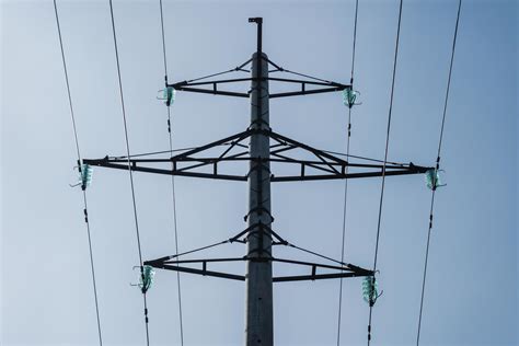 High-voltage concrete transmission tower on blue sky. 8905953 Stock ...