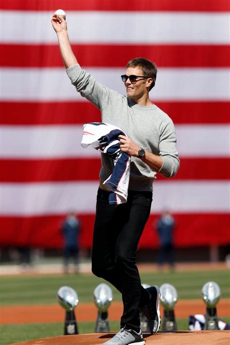 NE Patriots QB Tom Brady throws out the ceremonial first pitch at the Red Sox home opener at ...