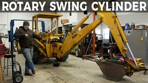 Massey Ferguson Backhoe Rotary Swing Cylinder Rebuild - YouTube