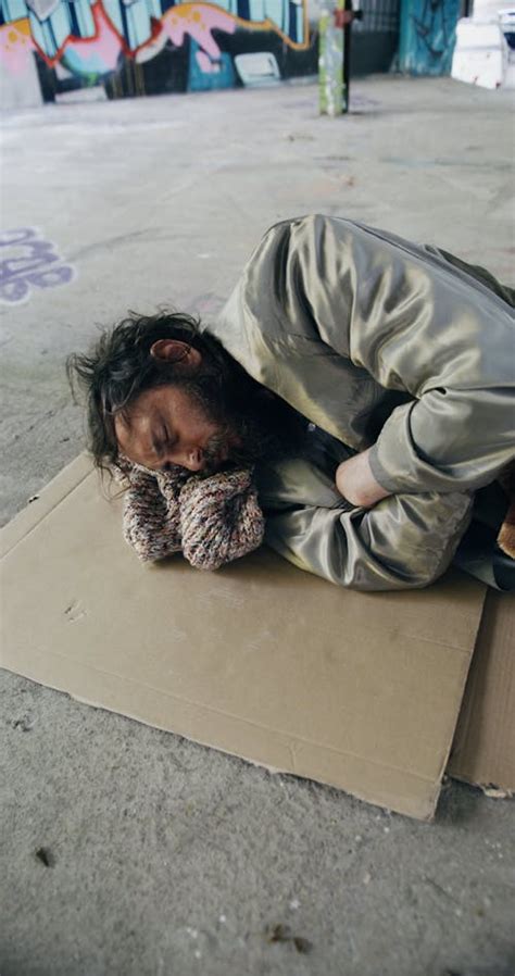 A Homeless Man Sleeping on the Floor · Free Stock Video