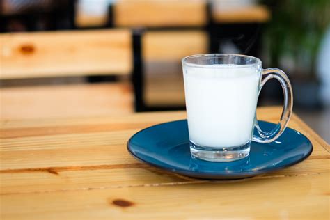 √ Hot Milk : Hot Milk In White Mug On White Table Soft Focus Stock Photo Picture And Royalty ...