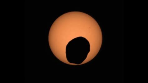 Mars through the Lens: NASA's Insights into Martian Solar Eclipses and Terrain