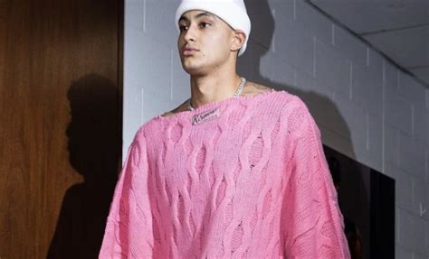 Kyle Kuzma Gets Clowned For Wearing an Oversized Pink Sweater - BlackSportsOnline