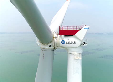 Giant wind turbine in china rises up to 70 floors and occupies 9 ...