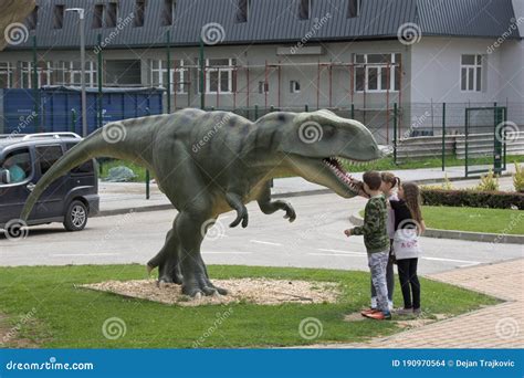 Children Watch a Dinosaur Model in Dino Park in Svilajnac, Serbia Editorial Stock Image - Image ...