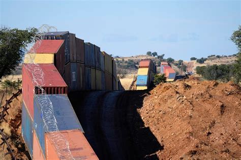 Border Wall Made of Shipping Containers Comes Down in Arizona, Rises in ...