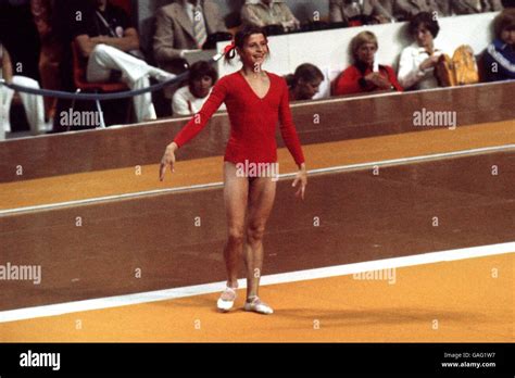 USSR's Olga Korbut performs her floor routine wearing a broad smile Stock Photo - Alamy