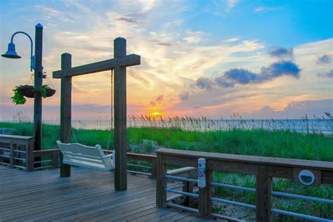 Carolina Beach Boardwalk Sunrise - Ranked one of the top 10 boardwalks ...