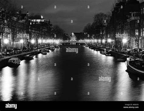 Amsterdam Canal at Night Stock Photo - Alamy