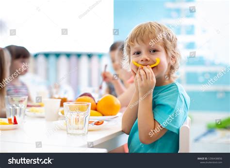 Funny Kid Boy Eating Fruits Kindergarten Stock Photo 1290438856 ...