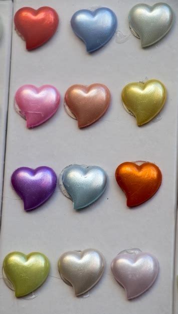 Premium Photo | Heart shaped colorful decorative objects