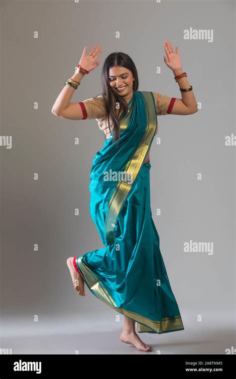 Woman dancing in saree Stock Photo - Alamy