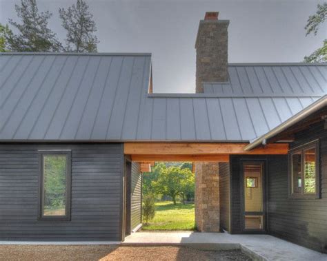 Gray metal house | Modern farmhouse exterior, House exterior, Farmhouse ...