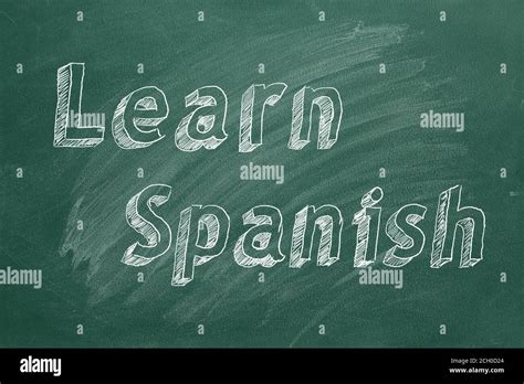 Hand drawing "Learn Spanish" on green chalkboard Stock Photo - Alamy