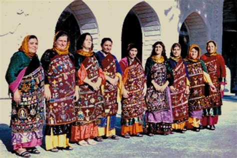 Traditional festive costumes of Bakhdida, nothern Iraq. Chaldean ...