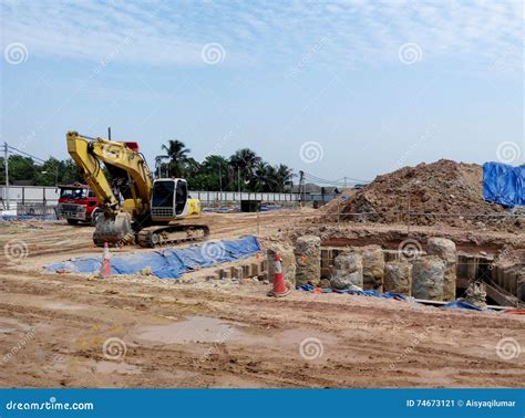 Excavator Machine Used To Excavate Soil at the Construction Site Editorial Photo - Image of ...