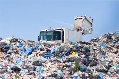 Garbage truck unloads stock photo. Image of plastic - 262275120