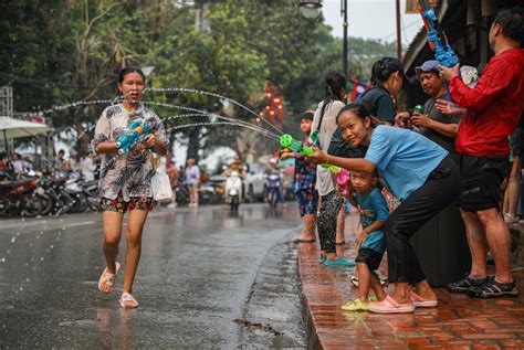 Laos celebrates new year in full tilt with pandemic precautions aside