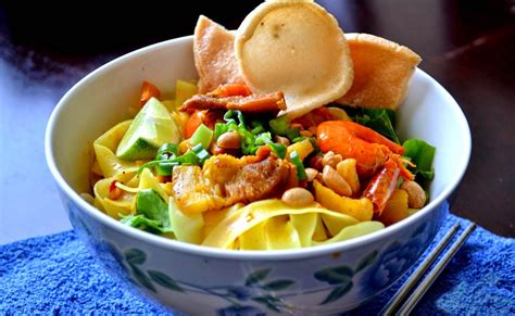 Quang Style noodle - this dish is made with rice noodles, white or tinted yellow with use of ...