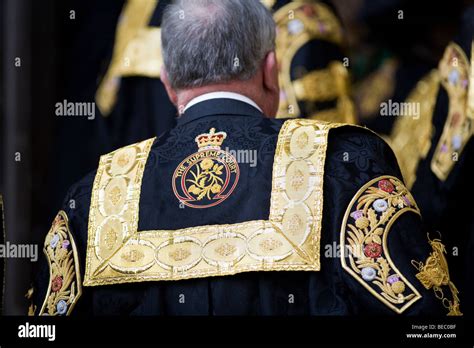 Supreme Court of the United Kingdom Justice robe logo emblem Stock Photo - Alamy