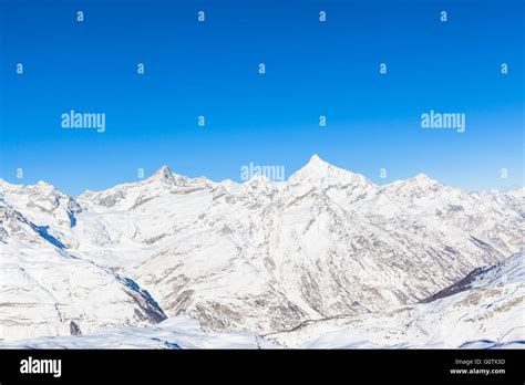 Panorama view of the Pennine Alps on the Italian-Swiss border near Zermatt, Switzerland. A ...