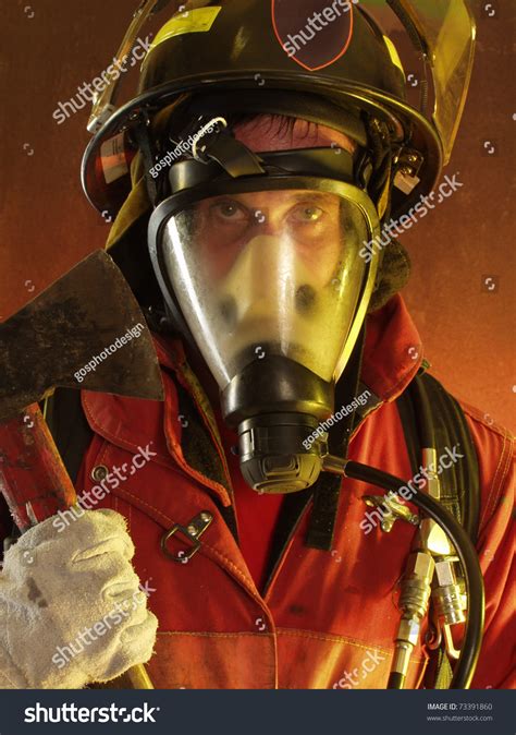 Firefighter In Action. Stock Photo 73391860 : Shutterstock