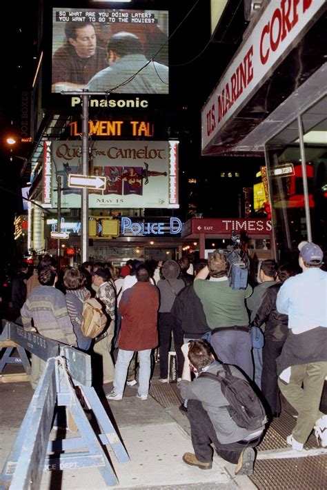 New Yorkers stop to watch the "Seinfeld" finale in Times Square, 1998 ...