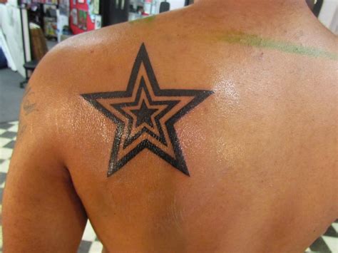 Star tattoos can be a symbol of fame or notoriety. A star within a star is a symbol of natural ...