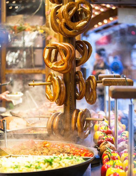 Pretzels And Food At German Christmas Market Photograph by Susan Schmitz