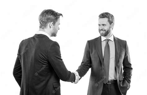 Premium Photo | Two businessmen colleagues shaking hands after ...