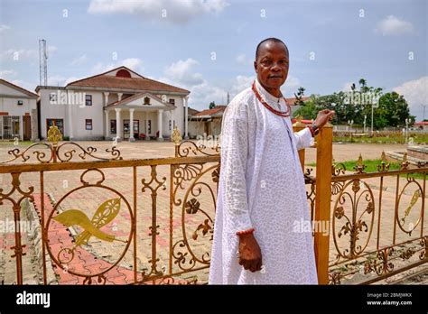 Portrait of an Edo nobleman in front of the Oba Palace in Benin City ...