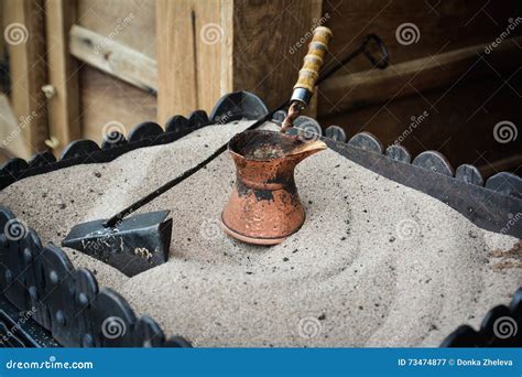 Pot for Preparation of Turkish Coffee on Hot Sand Stock Image - Image ...