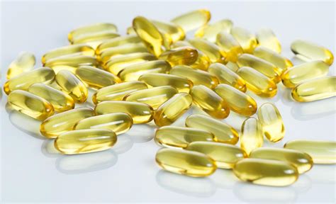 Fish oil capsules 7136146 Stock Photo at Vecteezy