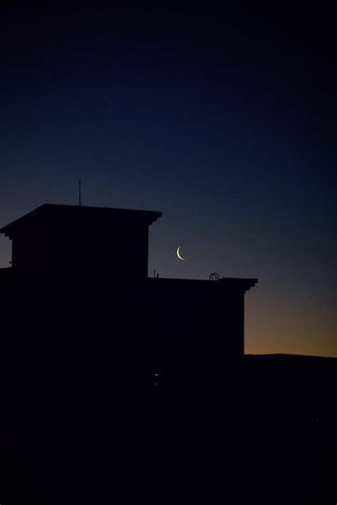 Silhouette of a Building During Night Time · Free Stock Photo