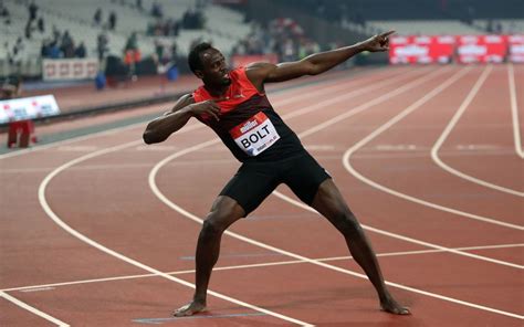 Usain Bolt celebrates intrademark style after cruising to victory ...