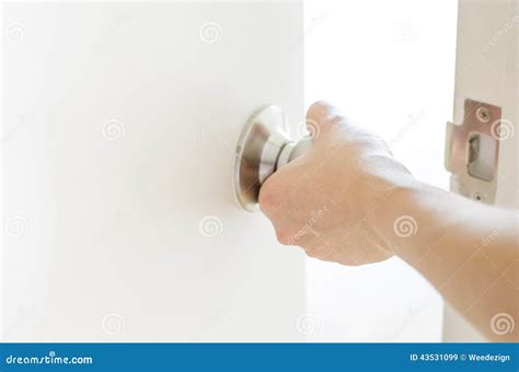 Hand Opening Door Knob,white Door Stock Image - Image of cracky, home: 43531099