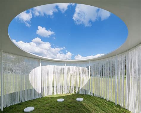 Translucent curtains surround "floating" Oasis pavilion by OBBA | Pavilion design, Outdoor ...