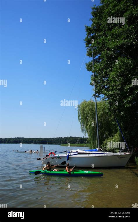 Paddling at a lake, Masurian Lake District, Poland Stock Photo - Alamy