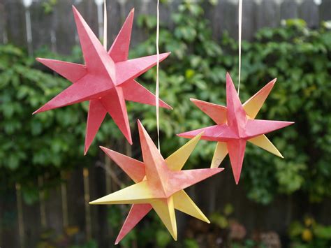 Folded Paper Christmas Origami Stars - The Magic Onions