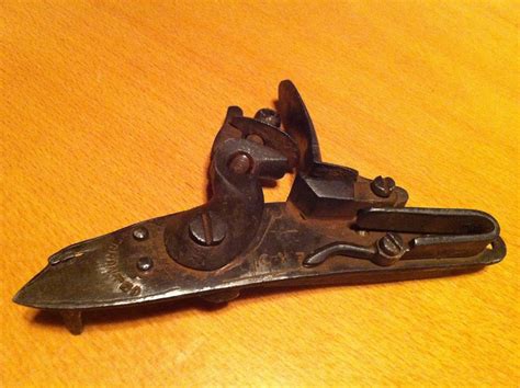 Flintlock mechanism (outside) | The firing mechanism of a fl… | Flickr