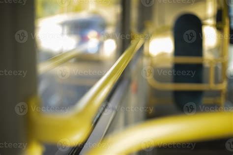 Interior of bus. Yellow handrail in transport. Public transport inside ...