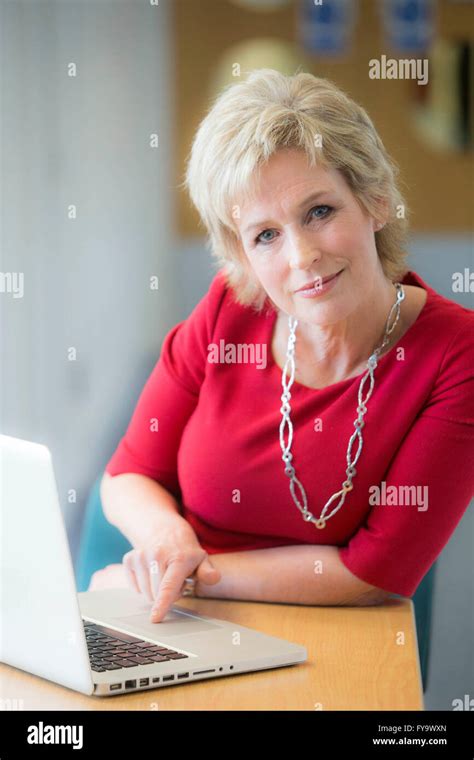 Sally Magnusson with laptop Stock Photo - Alamy