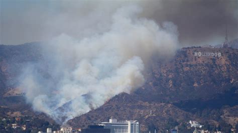 Hollywood -- Brush Fire Burning in Shadow of Famed Sign