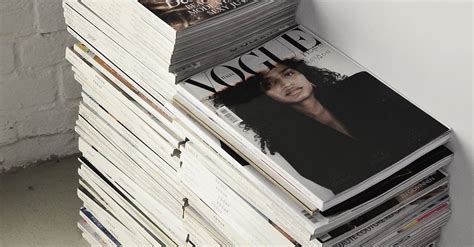 Stack of fashion magazines on floor · Free Stock Photo