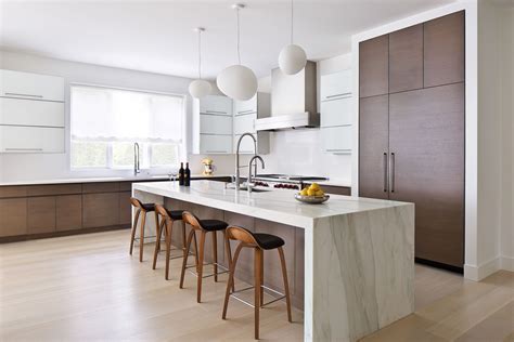 Modern kitchen with waterfall island countertop | Modern kitchen island ...