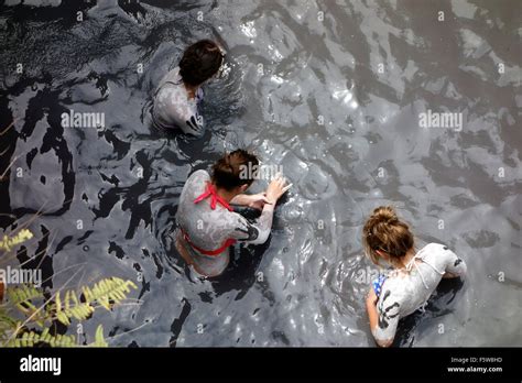 Young women taking mud bath at Sulphur Springs near the town of Stock ...