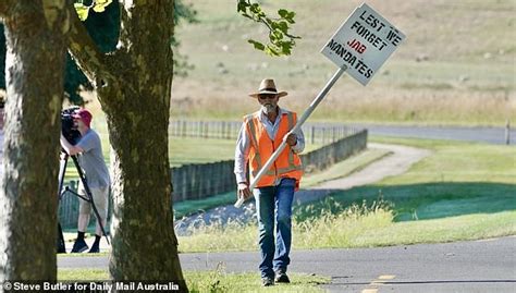 Jacinda Ardern's wedding day is picketed by anti-vax protestors as new details of her dress ...