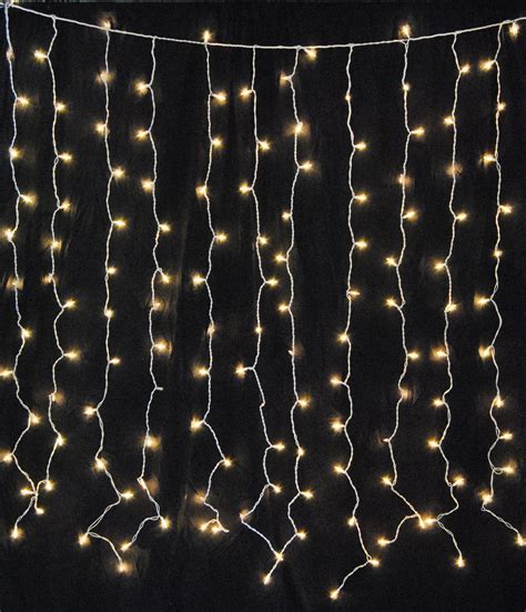 curtain string lights - Small Living Room Design Ideas You'll Want to Steal