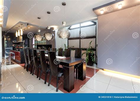 Huge Table in a Modern Dining Room Stock Photo - Image of house, furniture: 34531818